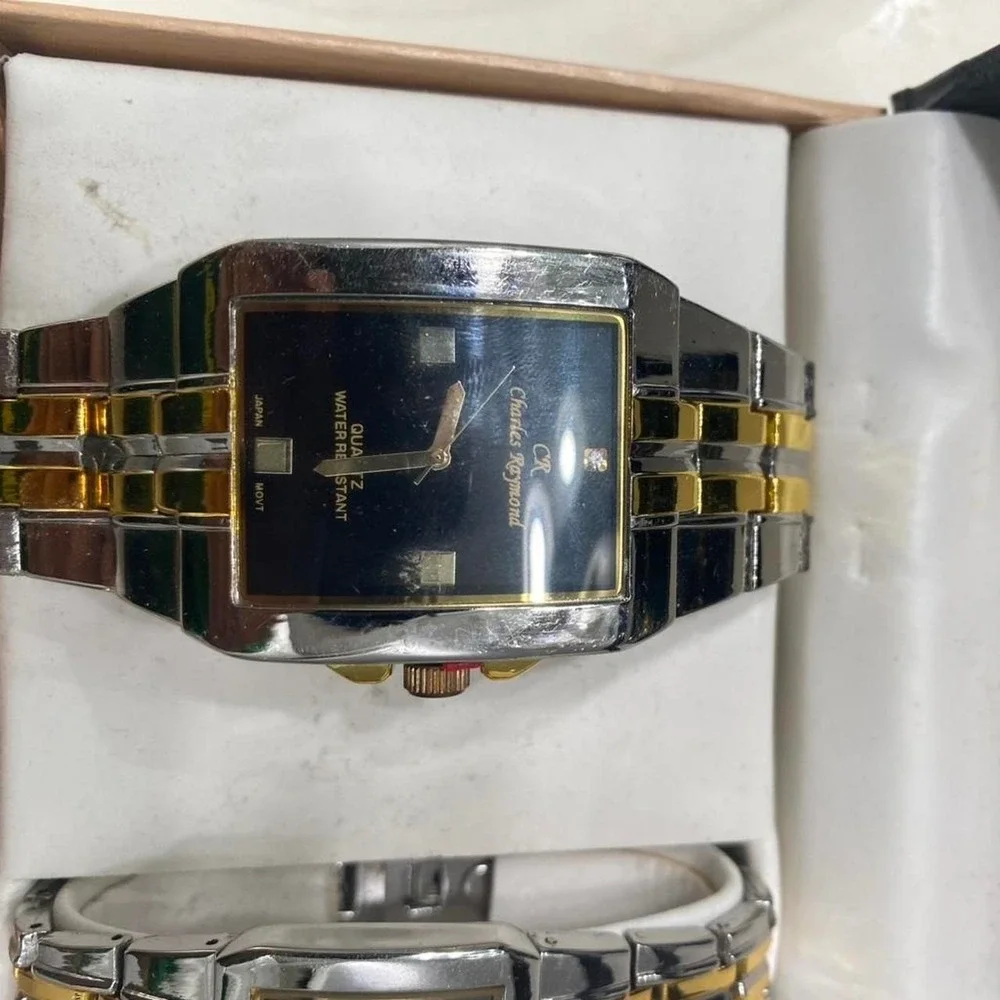 Vintage Charles Raymond His And Hers New York silver and gold watch set locks in